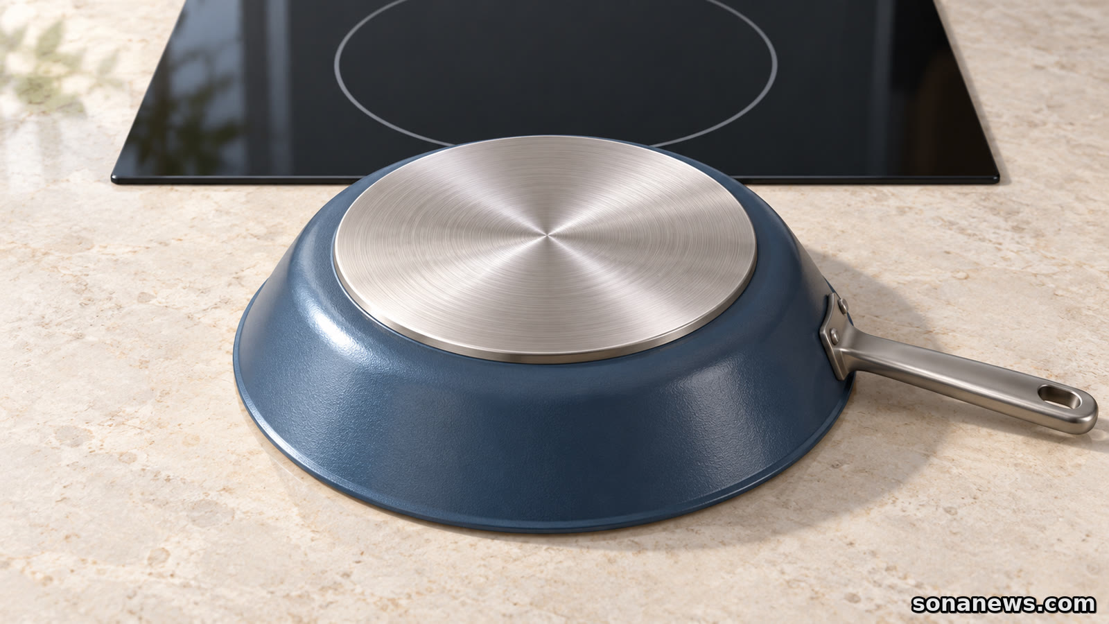 Illustration of an upturned frying pan with a smaller metal base beside an unlit induction hob cooking zone.