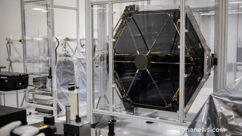 Spacecraft integration room with protected telescope mirror and inspection equipment, illustrating NASA Roman Space Telescope final launch checks.
