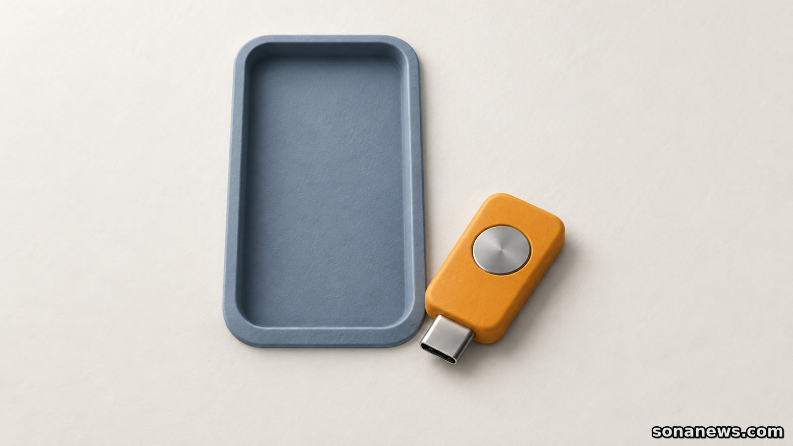 Ilustração de uma chave de segurança USB-C junto a um encaixe vazio de telemóvel, representando uma alternativa de acesso à conta.